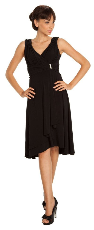 Black knee-length evening dress, sleeveless surplice bodice with pleated skirt