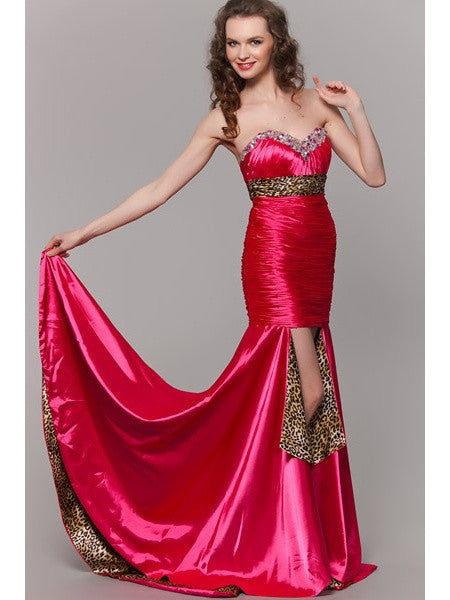 Fuchsia satin strapless dress with draped train and leopard-print lining