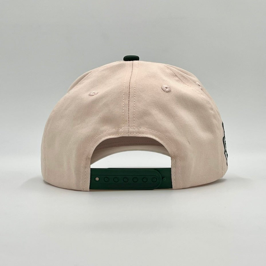 Cream snapback cap underside view with dark green adjustable band