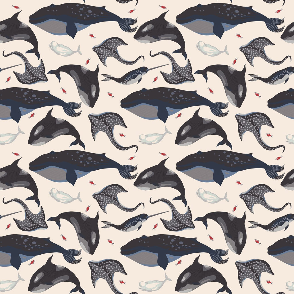 Ocean whale print footie fabric swatch with dark and light whales, navy and cream tones
