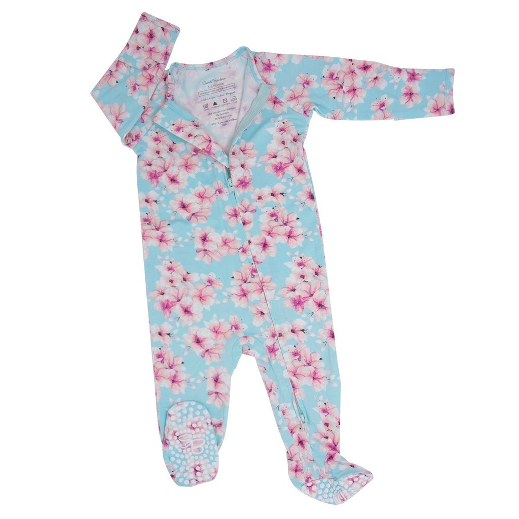 Girl's floral zipper footie in light blue with pink blossoms, long sleeves and zipper front